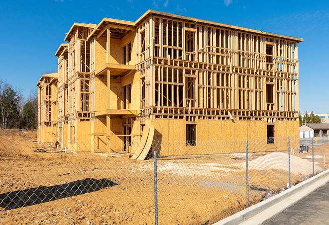 a snapshot of temporary chain link fences protecting a large construction project from unauthorized access in Enfield, CT